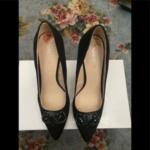 Gently worn suede bejeweled pumps.